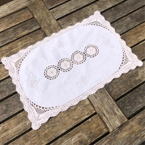 Vintage hand-crafted table mats tablecloth featuring charming crochet details beige