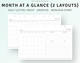 May include: White printable planner pages with the text "MONTH AT A GLANCE (2 LAYOUTS)". The pages include a monthly calendar layout and a month plan layout with space for notes and to-do lists. The pages are undated.
