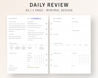 Könnte beinhalten: Ein druckbarer A5-Tagesplaner mit minimalistischem Design. Der Planer hat zwei Seiten, jede mit einem täglichen Check-in-Bereich, Platz für Top-Highlights, tägliche Stimmung, heutiges Essen und Selbstpflege, Herausforderungen und Lehren, Selbsteinschätzung, Notizen und Pläne für morgen. Das Datum ist der 27. Oktober.