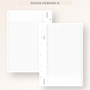 May include: Two white pages with a grid of circles and lines. The pages are labeled "Trackers" and "Habit", and have a hole punch on the left side. The text "DESIGN (VERSION 2)" is at the top of the page.