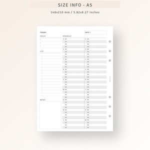 Peut inclure: Un planificateur quotidien A5 imprimable noir et blanc avec des sections pour aujourd'hui, focus, liste, emploi du temps et notes. Le planificateur mesure 14,8 cm sur 21 cm.