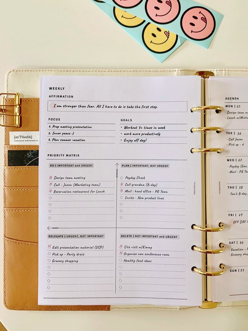 May include: A weekly planner with a brown leather cover and gold rings. The planner has a white interior with a section for weekly affirmations, goals, focus, and a priority matrix. The priority matrix is divided into four quadrants: Do Important and Urgent, Plan Important, Not Urgent, Delegate Urgent, Not Important, and Delete Not Important and Urgent. The planner also has a section for a daily agenda.