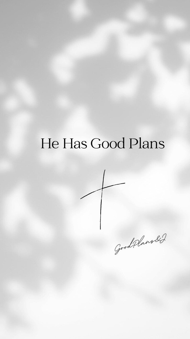 May include: A grayscale image with the text "He Has Good Plans" and a simple cross illustration. The words "Good Plans & J" are written in cursive at the bottom. The background has a soft, blurred effect.
