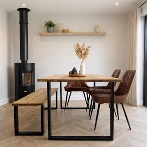 Reclaimed wood dining table with steel square box legs. - Matching benches available.