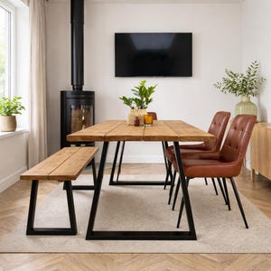Reclaimed wood dining table with steel Trapezium legs. - Matching benches available.