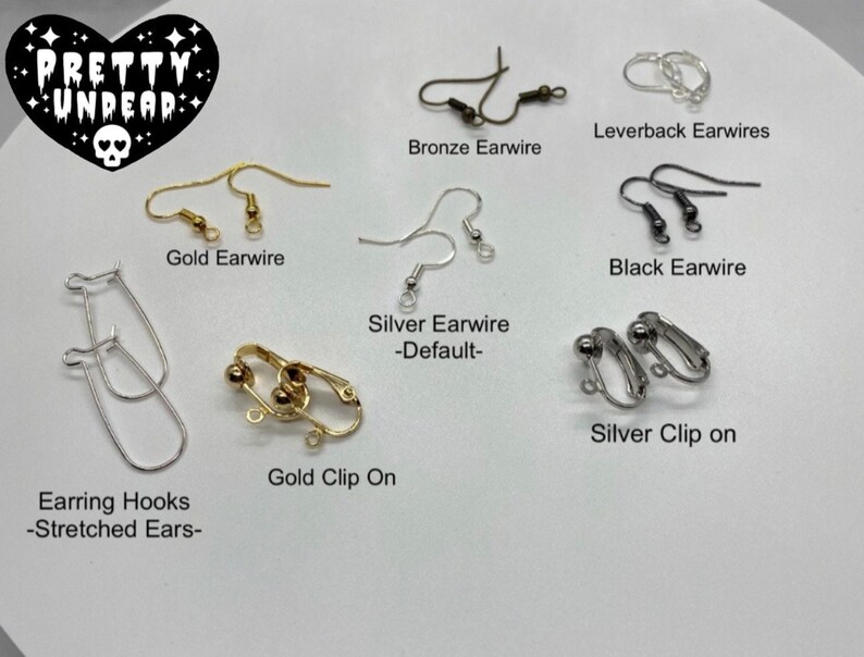 May include: Assortment of earring findings in gold, silver, and black.  Includes leverback earwires, earwires, clip-on earrings, and earring hooks for stretched ears.
