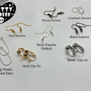 May include: Assortment of earring findings in gold, silver, and black.  Includes leverback earwires, earwires, clip-on earrings, and earring hooks for stretched ears.
