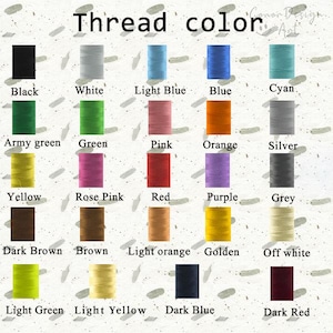 May include: A color chart displaying thread colors, including black, white, light blue, blue, cyan, army green, green, pink, orange, silver, yellow, rose pink, red, purple, grey, dark brown, brown, light orange, golden, off white, light green, light yellow, dark blue, and dark red.