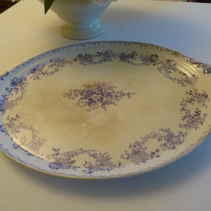 Imposing antique earthenware serving plate with handles, lavender blue, France, ironstone