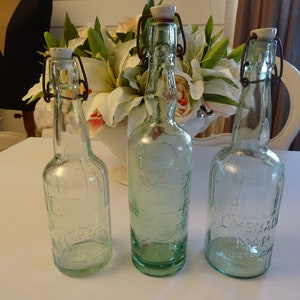 1 of 2, antique light green glass soda bottle, glass bottle, swing top, porcelain, soda bottle, France