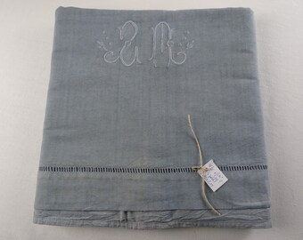 Sheet in dove grey with monogram - possibly "GM" or "SM" (11B)