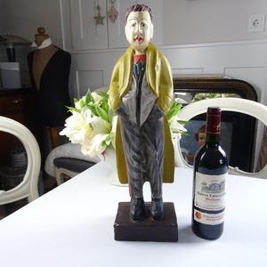 Antique carved wooden figure from the 1930s, Mr. Mantel