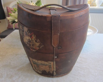 Antique hat case made of thick leather with stickers from France