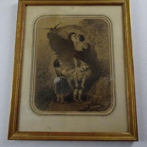 May include: A framed sepia-toned print depicting four children playing in a rocky landscape. The children are dressed in simple clothing and appear to be enjoying themselves. A small bird flies overhead.