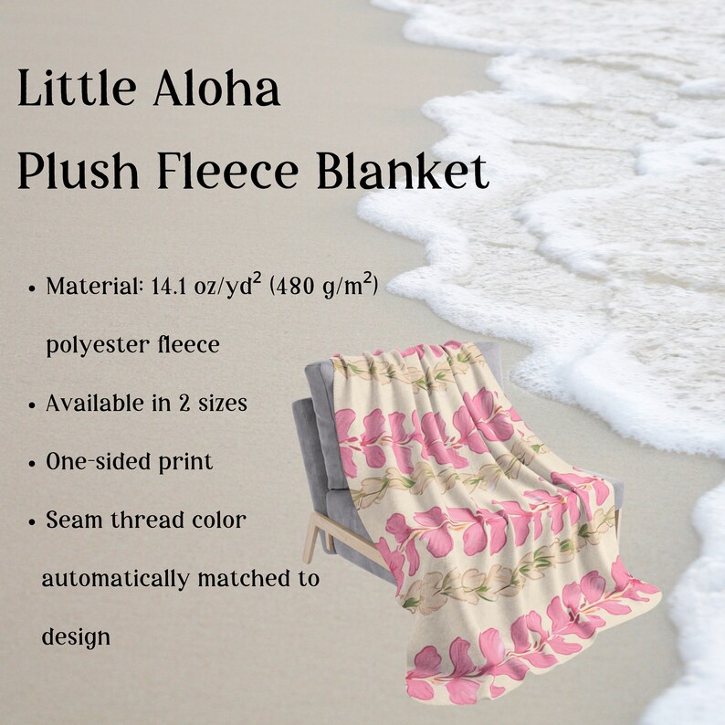 May include: A plush fleece blanket with a floral print featuring pink hibiscus flowers on a cream background. The blanket is folded and displayed on a chair. The text "Little Aloha Plush Fleece Blanket" is visible at the top of the image. The text "Material: 14.1 oz/yd&sup2; (480 g/m&sup2;) polyester fleece" is visible below the image. The text "Available in 2 sizes" is visible below the image. The text "One-sided print" is visible below the image. The text "Seam thread color automatically matched to design" is visible below the image.
