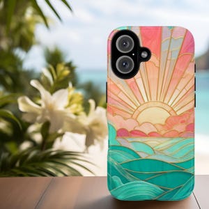 a colorful phone case with a sun and ocean design