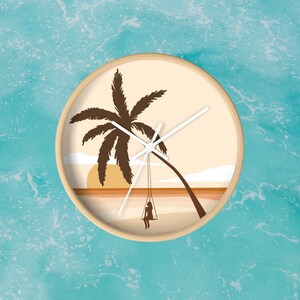 May include: A round clock with a beige background and a silhouette of a palm tree with a person swinging on a rope swing. The clock hands are white and the clock face is surrounded by a wooden frame.