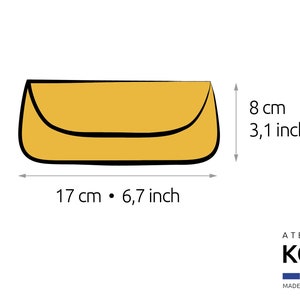 May include: A yellow clutch purse with a black outline. The purse measures 6.7 inches by 3.1 inches.