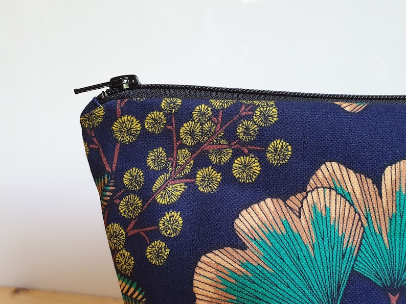 Large toiletry bag with ginkgo and mimosa patterns on a navy blue background waterproof lining image 5