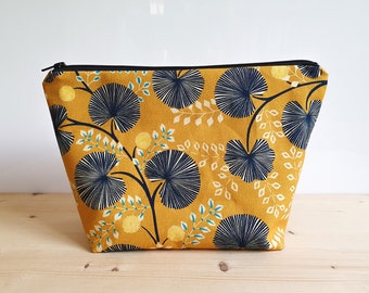 Large cotton toiletry bag with flower patterns on a gold background - waterproof lining