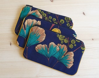 Cotton purse with ginkgo and mimosa patterns on a navy blue background