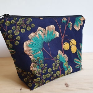 Large toiletry bag with ginkgo and mimosa patterns on a navy blue background waterproof lining image 3