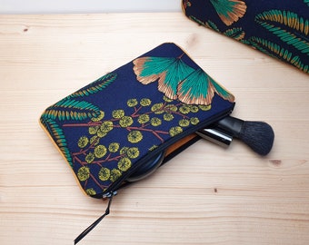 Fleece pouch - cotton makeup bag with ginkgo and mimosa patterns on a navy blue background
