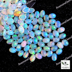 Opale etiope 7 x 5 mm Pietra preziosa, Opale etiope naturale multi fuoco Forma ovale 10 pezzi Lotto per gioielli, Gioielli in opale etiope multi lampeggiante