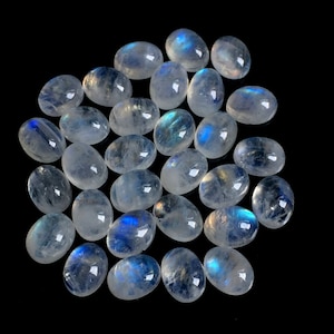 10 piezas Moonstone Cabs 6x8 mm Cabujón ovalado, piedra lunar arco iris de alta calidad para la fabricación de joyas lote 11 Suministro artesanal de piedra lunar