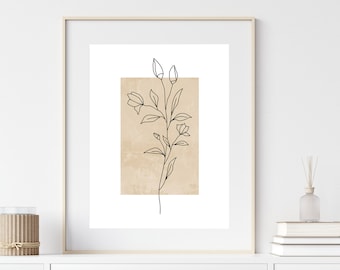 May include: A framed print of a minimalist line drawing of a flower with a beige background.