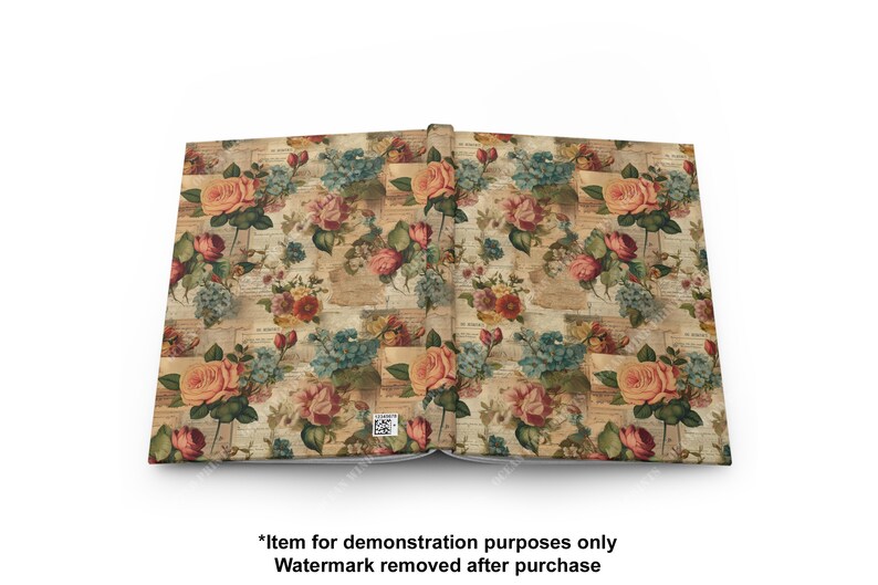 May include: An open book with a vintage floral pattern on the pages. The pattern features roses, blue flowers, and green leaves on a beige background with faded text.
