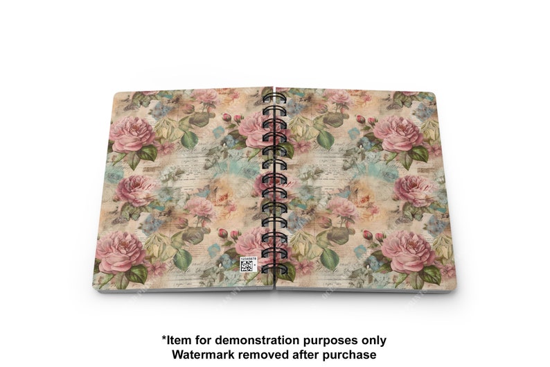 May include: A spiral bound notebook with a vintage floral design featuring pink roses and a faded background. The cover has a distressed look with a subtle text pattern.