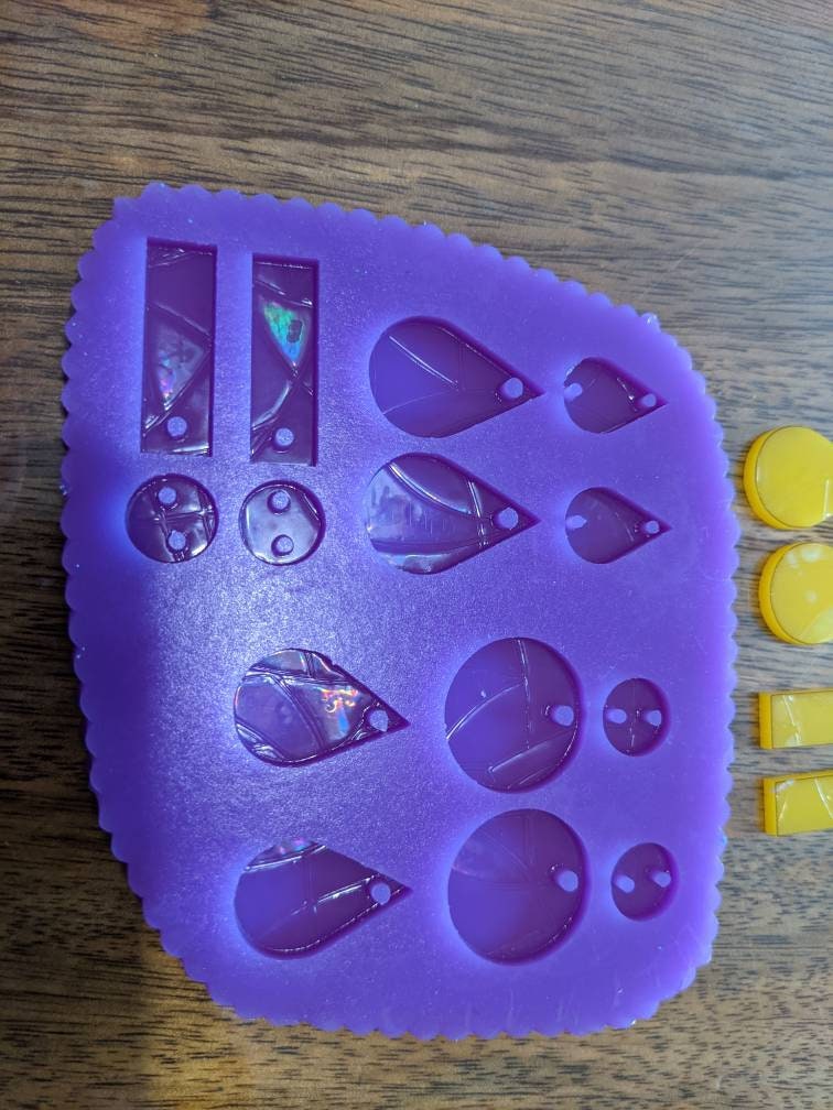 silicone mould contains 4/5 pairs of holographic earrings