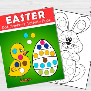 以下が含まれることがあります： 黄色いひよこ、デコレーションされた卵、ウサギが描かれたイースターをテーマにしたドットマーカーアクティビティブック。本のタイトルは「Easter Dot Markers Activity Book」です。