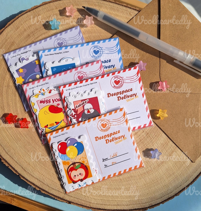 May include: A set of five colorful sticker sheets with different designs. The sticker sheets are shaped like envelopes and feature illustrations of a chick, a person with a hat, a red apple, and a balloon. The sticker sheets have the text "Deepspace Delivery Sticker Set" printed on them.