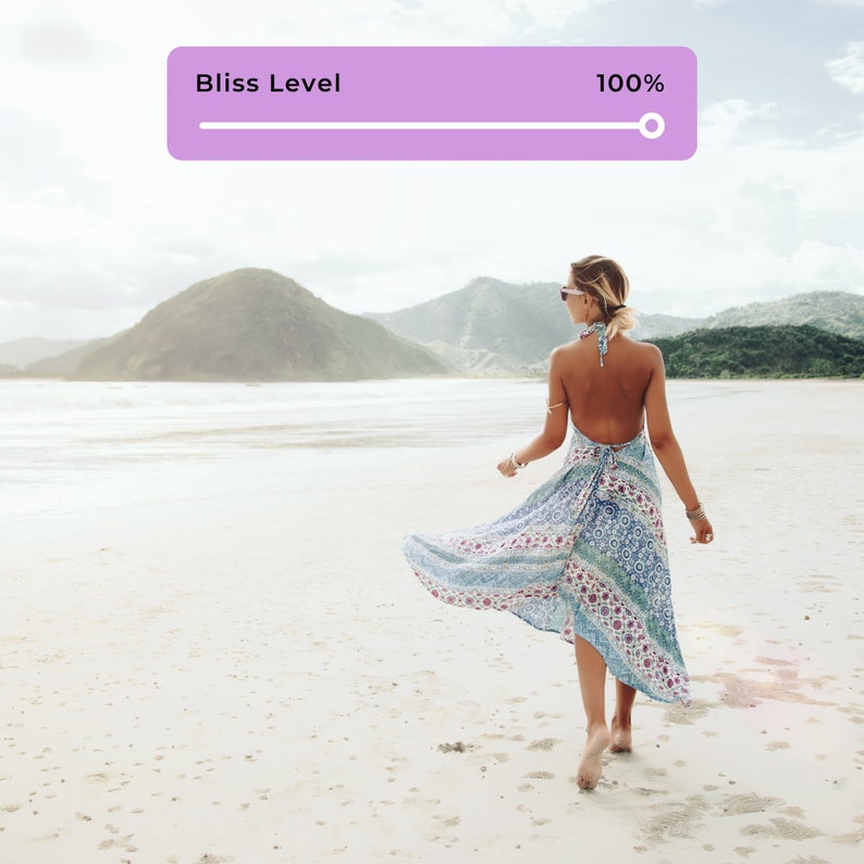 woman walking on sand, in bliss