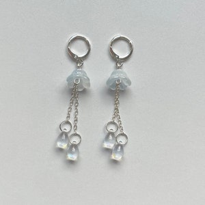 aquatic glass jellyfish dangling silver huggie hoop earrings Light Blue