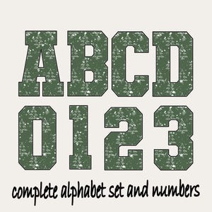 May include: Green alphabet letters and numbers with a Christmas tree pattern and white snowflakes. The text "complete alphabet set and numbers" is below the letters and numbers.