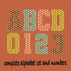 May include: A digital graphic featuring the letters A, B, C, D and the numbers 0, 1, 2, 3 in a block varsity font. Each character is colored in shades of brown, green, or orange and covered in a white polka dot pattern. The text complete alphabet set and numbers is written in black at the bottom.
