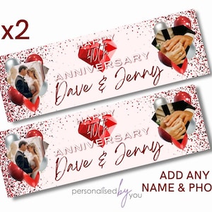 May include: Two banners with a light pink background, red accents, and the text "Happy 40th Anniversary Dave & Jenny." Each banner features a photo, balloons, and the words "Add Any Name & Photo."