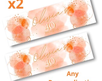 May include: Two peach and gold watercolor-style table runners with the text "Olivia's 40th Birthday".