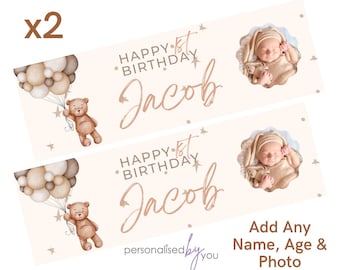 May include: Two beige and brown banner designs with a teddy bear holding balloons, a baby in a photo frame, and the text "HAPPY 1ST BIRTHDAY Jacob" in gold script.