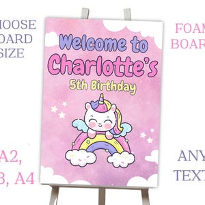 May include: A pink and purple welcome sign with a unicorn sitting on a rainbow. The sign says "Welcome to Charlotte's 5th Birthday".