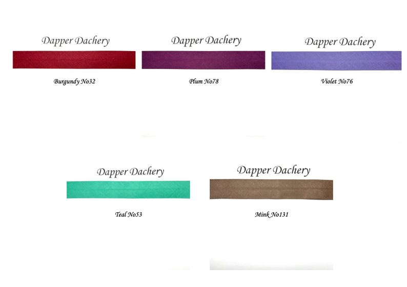 May include: Five fabric swatches in different colors, labeled with the brand name "Dapper Dachery" and color names and numbers: Burgundy No32, Plum No78, Violet No76, Teal No53, and Mink No131.