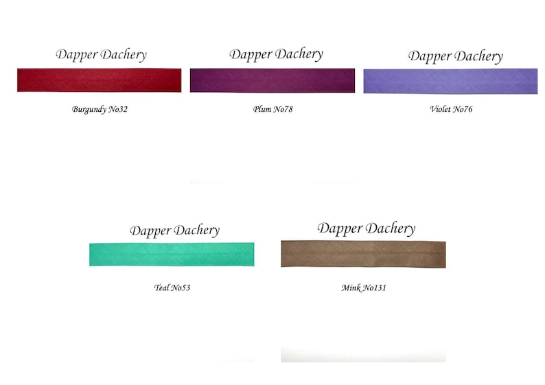 May include: Five fabric swatches in different colors, labeled with the brand name "Dapper Dachery" and color names and numbers: Burgundy No32, Plum No78, Violet No76, Teal No53, and Mink No131.