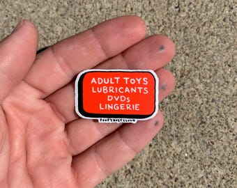 adult store sign, adult toys/lubricants/dvds/lingerie roadside attraction sticker