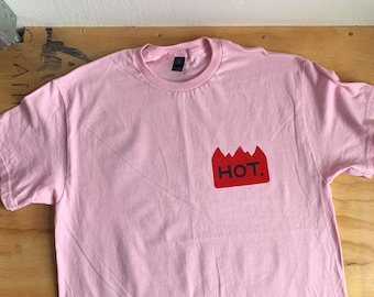 PREORDER - “hot.” flame tee with hand over flame back - ships late-May