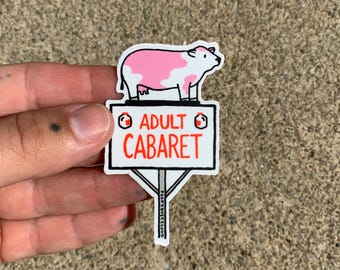 adult cabaret sign with cow roadside attraction sticker