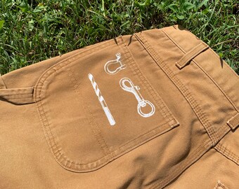 33W x 34L tan all-over hardware print Dickies carpenters pants