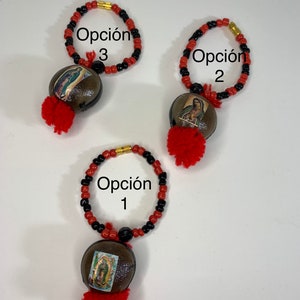 Pulsera de bebé met Ojo de Vendado en foto van La virgencita